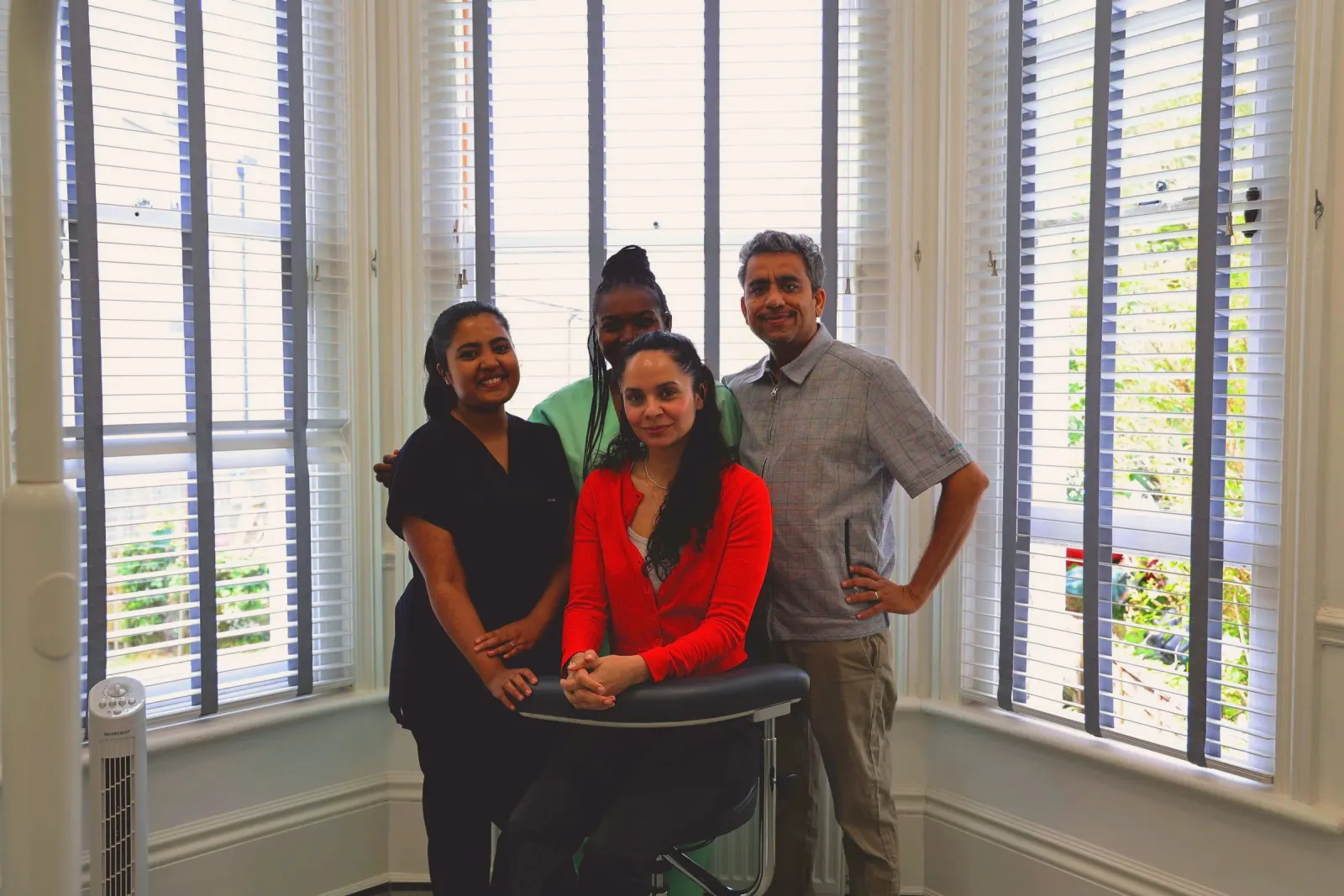 The Aspen Dental Care team — dentist and nurses